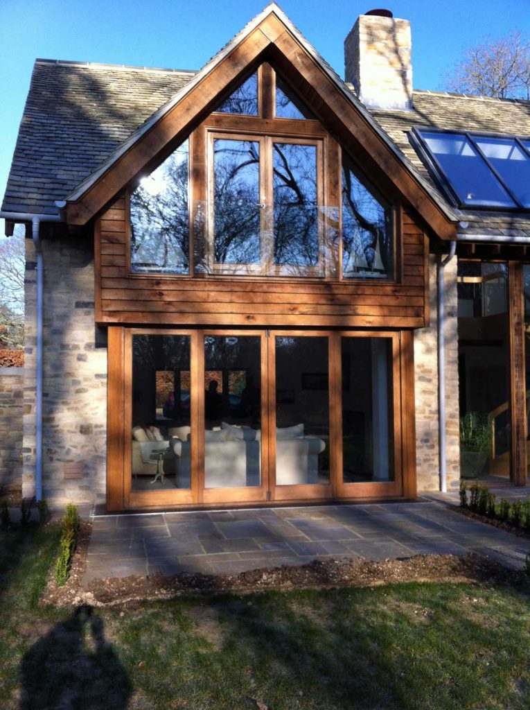 windows and wooden bi-fold doors