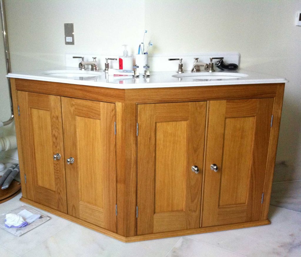 wooden cabinet with sink on top