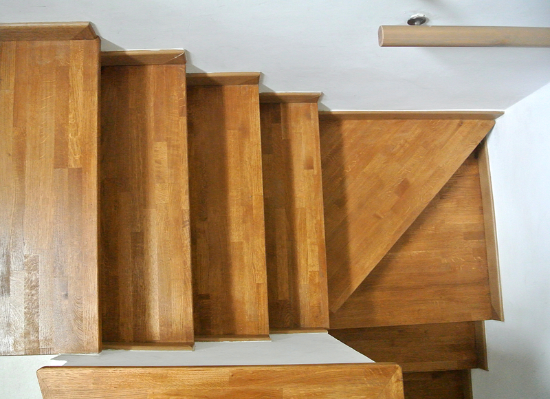 Curved internal wooden staircase, crafted by CAD Joinery