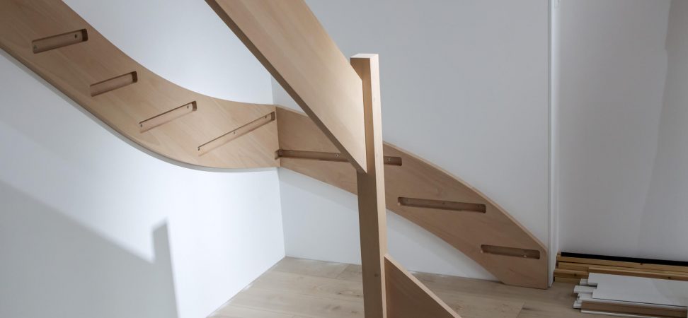 A installation of a wooden staircase in the house